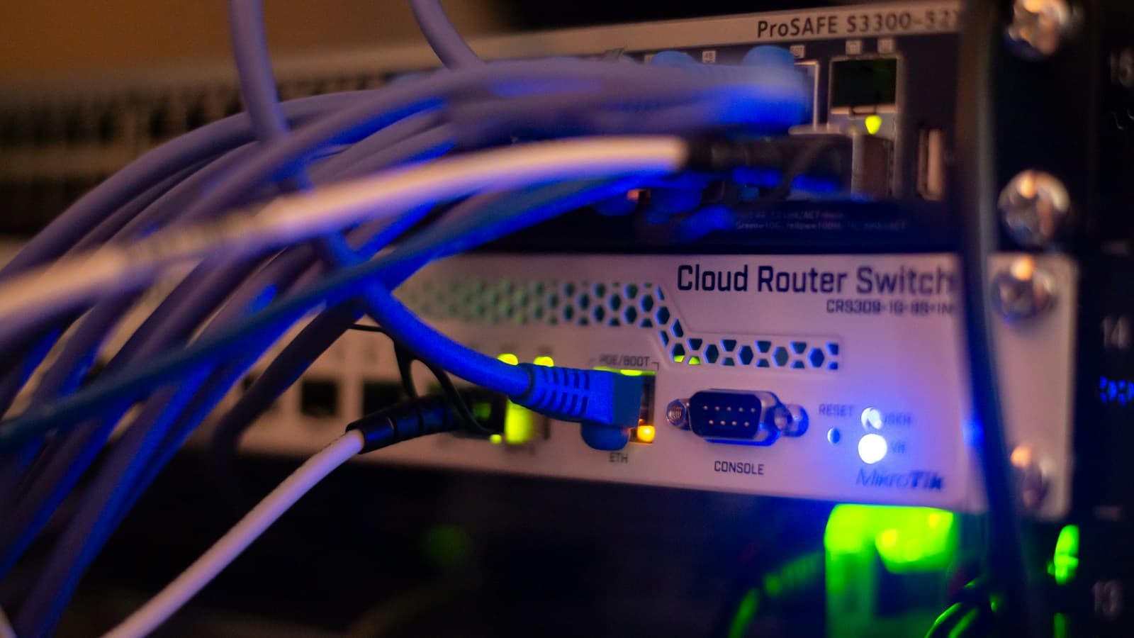A close-up of network cables connected to a router switch