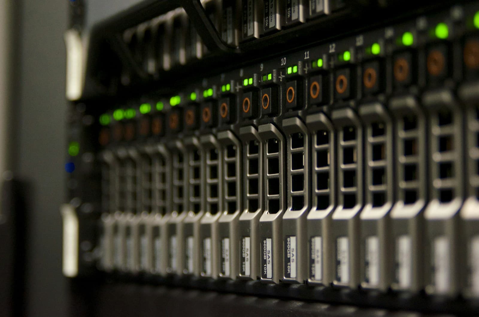 Rows of servers with green status lights in a server rack